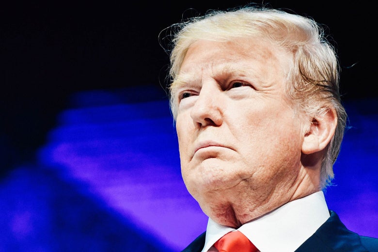 President Donald Trump looks on before delivering a speech during the World Economic Forum on Friday in Davos, Switzerland.